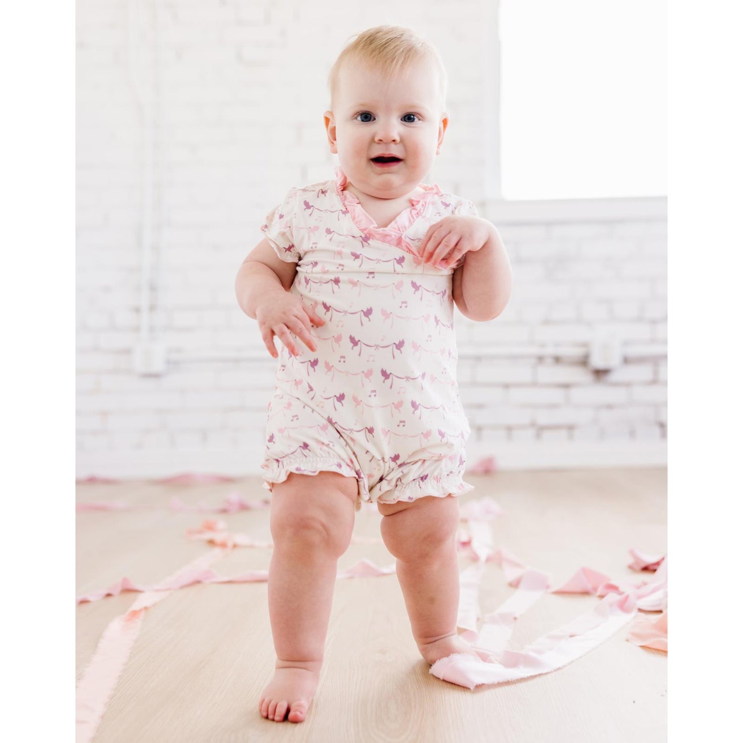 Print Ruffle Romper in Natural Bird Banner